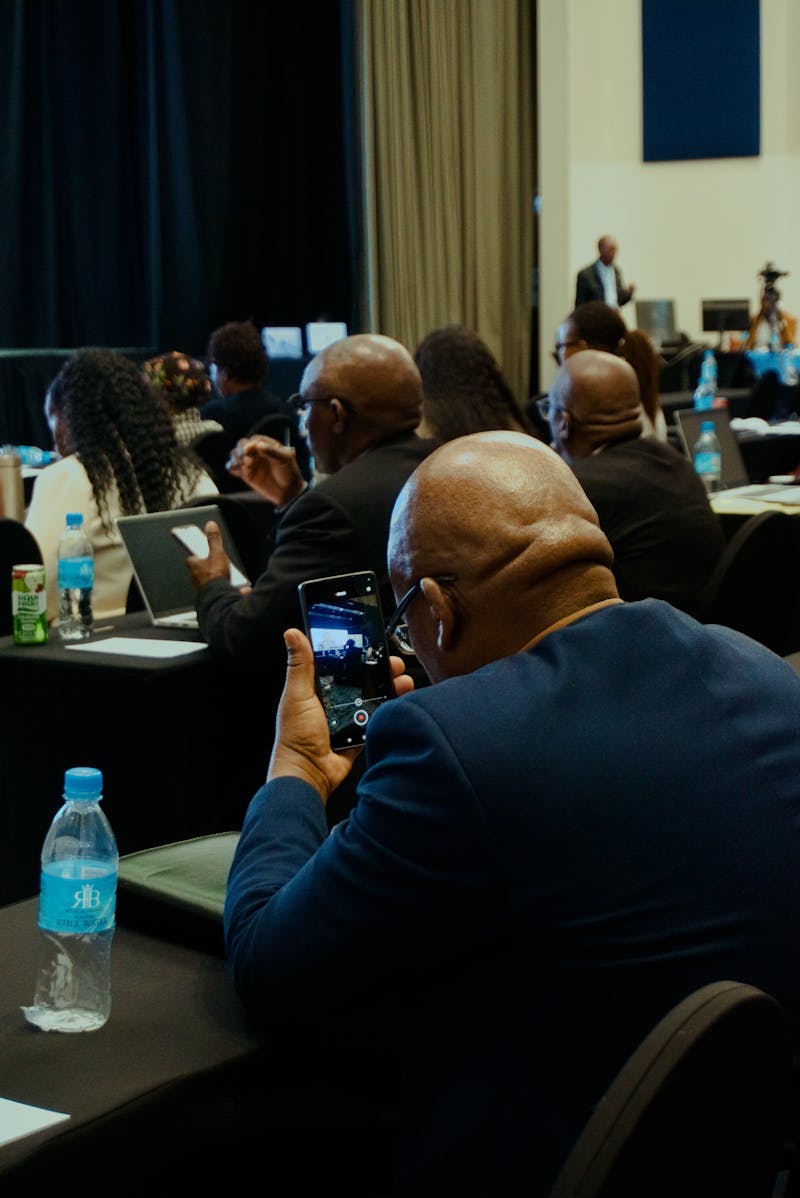 A senior South African executive in a professional environment.